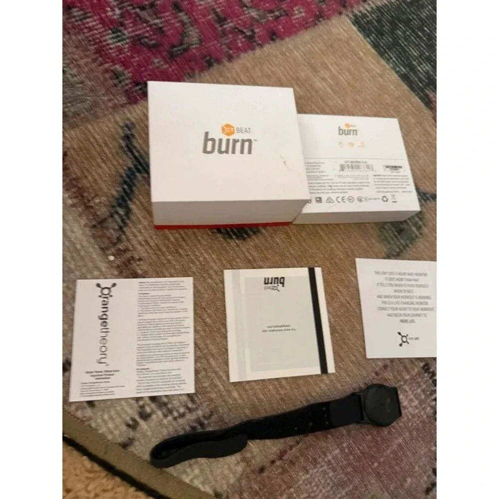Orange theory heart monitor and box